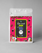 Kattan Kooppi coffee package with pink label on a gray background